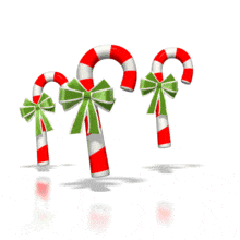Three candy canes jump up and down in this powerpoint animation.