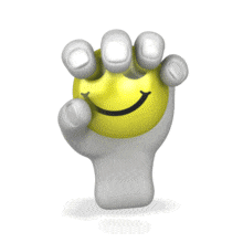 A hand squeezes a stress ball with a smiley face on it.