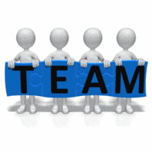 A group of stick figures holds up pieces of a puzzle that forms the word &#039;TEAM&#039;.