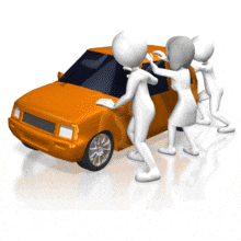 Three rioters rock a car back-and-forth.