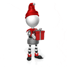 An elf shakes a Christmas present, wondering what&#039;s inside.