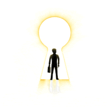 This animation shows a businessman holding a briefcase standing in a large keyhole with light emanating from it.