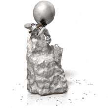 This animation shows a businessman caving herself out of stone.  Displays the idiom of being self made.