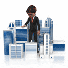 A businessman looks at and picks up different buildings.
