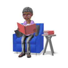 Bernice seated in a chair and turning the pages in a book she is reading. 