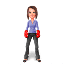 A business woman wearing boxing gloves raises her hands in victory.