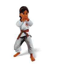 Karate girl performs a precise roundhouse kick—ideal for martial arts training, confidence building, and youth-focused presentations.