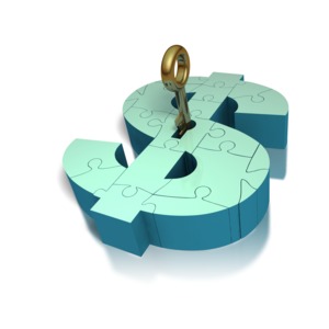 A key is inserted into a dollar sign made up of puzzle pieces in this business clipart.