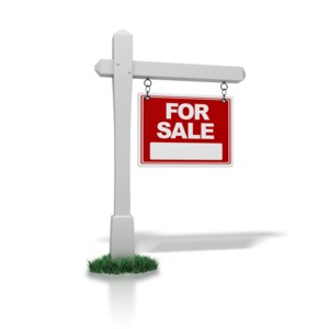 A red &quot;for sale&quot; sign hangs from a white post in this clipart.