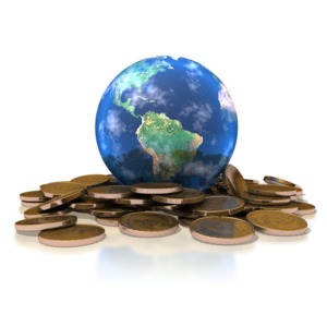 The earth sits on top of a pile of gold coins in this global financial clipart.