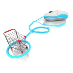 A cord comes out from a computer mouse and makes a circle at the end with a shopping cart with presents resting in the middle.