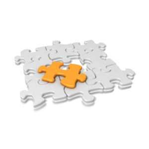 A single orange puzzle piece remains to be placed into the completed puzzle in this problem and solution concept.