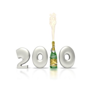 A bursting champagne bottle stands in place of the number one in the 2010 new years clipart.