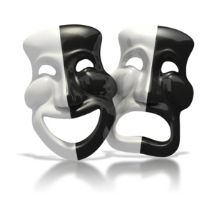An image of two stylized comedy and tragedy theater masks.  Both masks are split down the center, white on one side and black on the other.