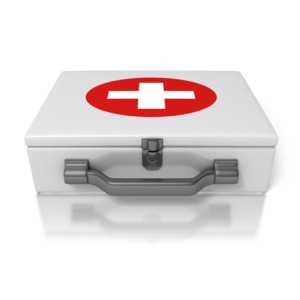 An image of a first aid kit.  A white plus sign inside a red circle denotes this as a first aid kit.