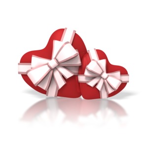 A image of two red hearts wrapped in pretty pink ribbons and bows.  A perfect piece of clipart for Valentines Day or anywhere you would like to express some love or romance.  The two hearts could symbolize a couple or relationship between two people.
