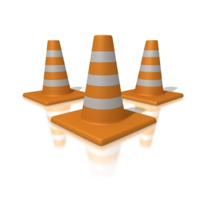 An image of three traffic cones or pylons grouped in a triangle. A good image for indicating a warning, caution or construction ahead.