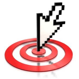 An image of a computer mouse pointer hovering over the top of a red target.  The mouse pointer is aimed at the center of the target.  A good image for illustrating the concept of on target or reaching goals.