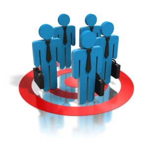 An image of a group of business stickmen standing on top of a red target.  This could be used as a concept for target audience or focus group. 