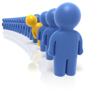 This clipart image shows a line of blue character with a yellow orange character peering out of the line.  This graphic could be used in presentations about standing out from the crowd.