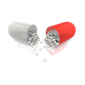 This clipart image shows a pharmaceutical  pill broken open spilling medication out.  This graphic could be used in presentations about health care, medicare, pharmaceutical and medical.