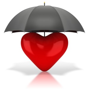 This is an image of a red heart under a black umbrella. This image could represent protecting your heart regarding love or protecting yourself with health insurance.