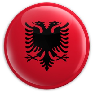 An image of Albania&#039;s flag on a badge.
