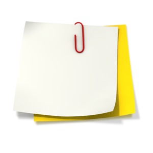 Red paper clip attached to a yellow and white sticky note.