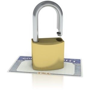 This clipart image shows a lock unlocked on top of a social security card signifying that social security is not secure.  This graphic could be used in presentations about retirement, social security, benefits, and identity.