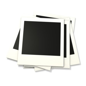 An image of a pile of stacked photographs.