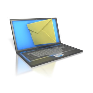 This clipart image shows a laptop computer with a letter coming out of the screen. 