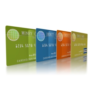 This clipart image shows a line of banking cards.  This graphic could be used in presentations about debt, loans, finances, banking and credit cards.