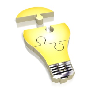 This clipart image shows a light bulb made out of puzzle pieces.  This graphic could be used for presentations about innovation, ideas, brainstorming, business, technology, and education.