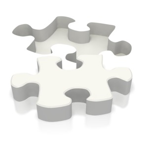 This clipart image shows a puzzle piece taken from the ground.