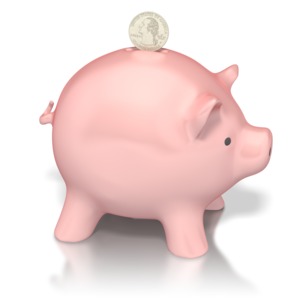 This clipart image shows a piggy bank with a quarter being inserted.  This graphic would be good for presentations about money and finances.