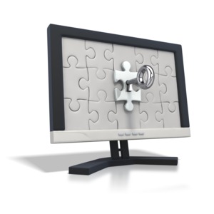 An image of a key being inserted into the puzzle piece on a computer monitor.