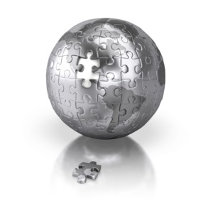An image of a silver world with connected puzzle pieces and a missing piece on the ground.