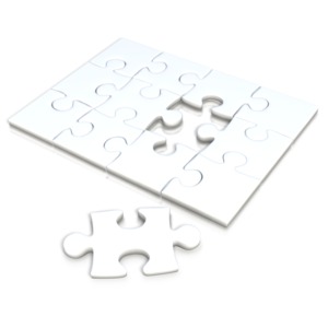 An image of a square white puzzle set with a single piece set aside.