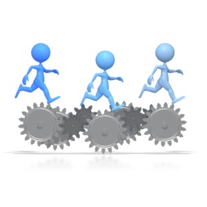 This clip art image shows three blue stick figures running on gears.