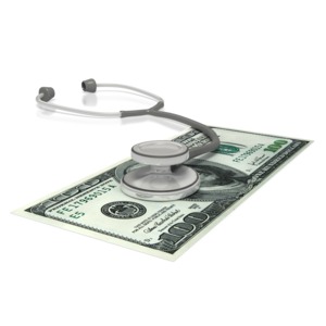 This clip art image shows a stethoscope on top of a hundred dollar bill.