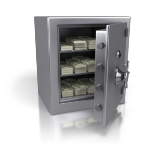 An image of a safe containing stacks of cash.