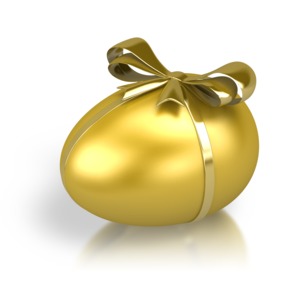 An image of a golden egg wrapped with a ribbon.
