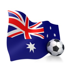 This clip art image shows an Australian flag with a soccer ball sitting next to it.  