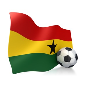 This clip art image shows an Ghana flag with a soccer ball sitting next to it.  