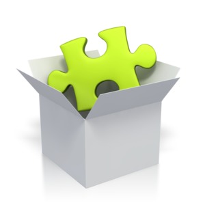 This clip art image shows a green puzzle piece inside of a white box.