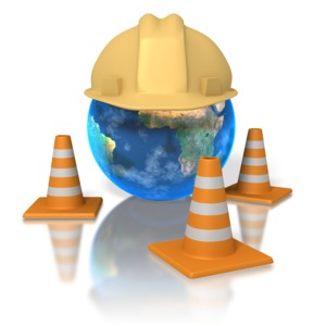 Clipart of the planet earth wearing a hardhat and surrounded by traffic cones.  A concept of fixing the earth or construction.