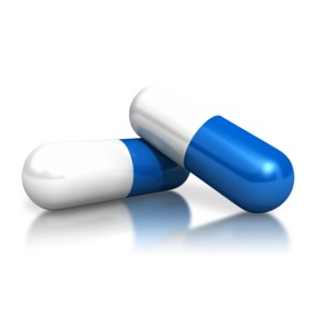 An image of two white and blue pills/capsules.