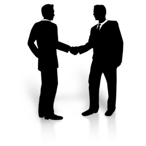 An image containing a silhouette of businessmen shaking hands.