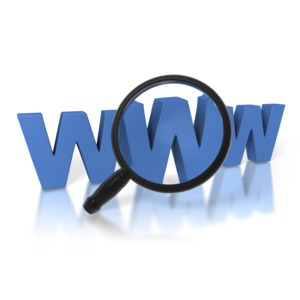 A black magnifying glass takes a close up look at the letters WWW.  A presentation clip art concept of searching the World Wide Web or Internet.
