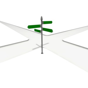 An image of a street intersection with a road sign.